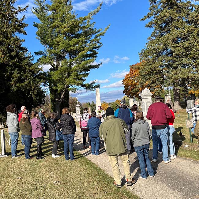 A group of people at the Greenbush Cemetery Walk