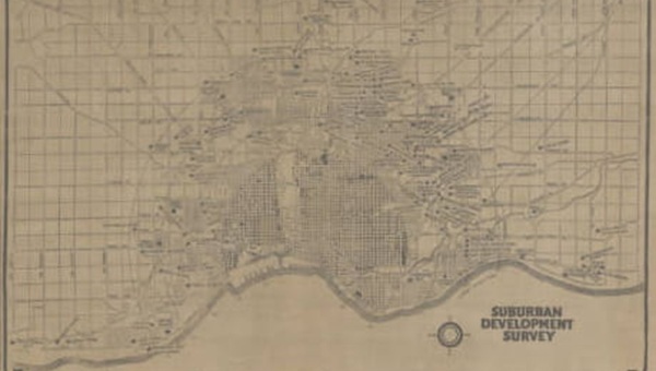 A brownish map with black writing shows Milwaukee County suburban development