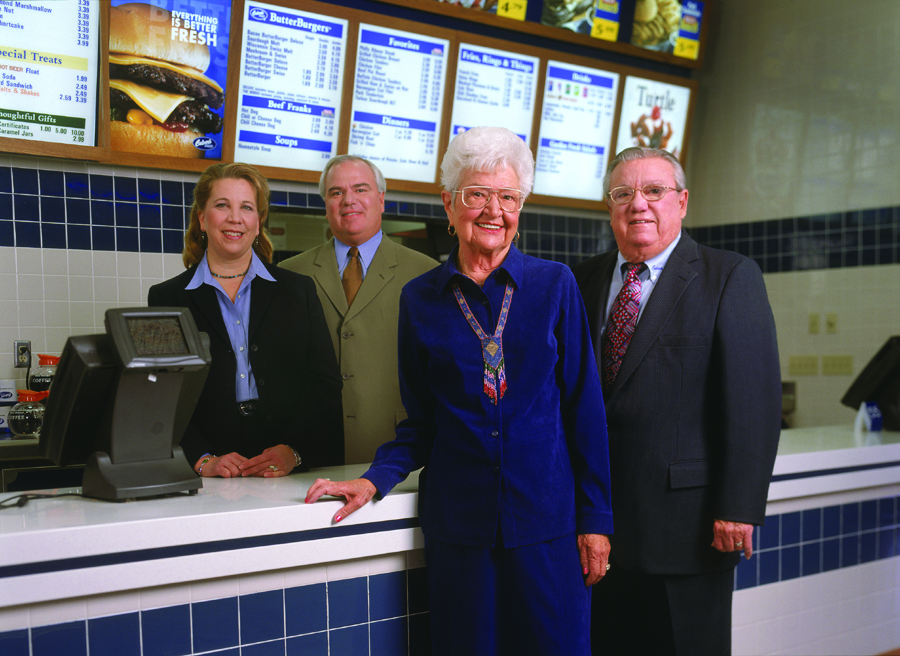 The Culver family poses at the counter of one of their namesake restaurants. (left to right: Lea, Craig, Ruth and George)