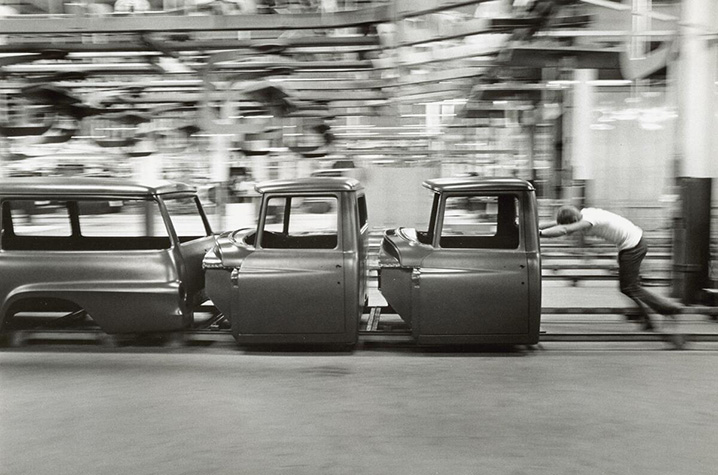 International cabs and bodies being pushed down the line by a man at the Springfield plant.