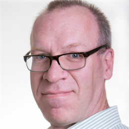 Headshot of Mark D. Van Ells