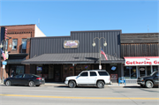 240 S KNOWLES AVE, a Commercial Vernacular large retail building, built in New Richmond, Wisconsin in 1915.