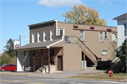 404 N KNOWLES AVE, a Commercial Vernacular tavern/bar, built in New Richmond, Wisconsin in 1920.