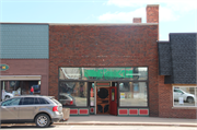 121 North Lake Avenue, a Commercial Vernacular retail building, built in Phillips, Wisconsin in 1930.