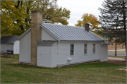 9770 STH 19, a Front Gabled one to six room school, built in Mazomanie, Wisconsin in 1860.