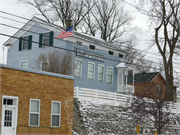 MILWAUKEE ST, a Greek Revival house, built in Theresa, Wisconsin in 1847.