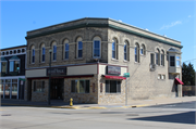 99 S MAIN ST, a Queen Anne retail building, built in Fort Atkinson, Wisconsin in 1895.