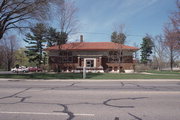 106 W 1ST ST, a Prairie School library, built in Merrill, Wisconsin in 1909.