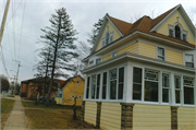 74 N MAIN ST, a Colonial Revival/Georgian Revival house, built in Markesan, Wisconsin in 1914.