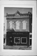 325 MAIN ST, a Italianate small retail building, built in Darlington, Wisconsin in 1880.