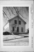 404 WELLS ST, a Greek Revival house, built in Darlington, Wisconsin in 1853.