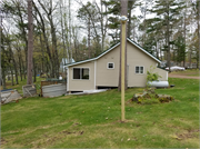7049N Lake Shore Drive, a Rustic Style resort/camp building, built in Couderay, Wisconsin in 1974.