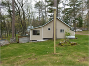 7049N Lake Shore Drive, a Rustic Style resort/health spa, built in Couderay, Wisconsin in 1974.