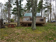 7049N Lake Shore Drive, a Rustic Style resort/health spa, built in Couderay, Wisconsin in 1974.