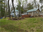 7049N Lake Shore Drive, a Rustic Style resort/health spa, built in Couderay, Wisconsin in 1974.