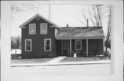 MAIN ST, AT INTERSECTION WITH SCHOOL ST, E SIDE, a Gabled Ell house, built in Gratiot, Wisconsin in 1870.