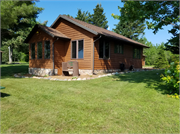 9403W-9429W Deer Path Drive, a Rustic Style resort/camp building, built in Hayward, Wisconsin in 1965.
