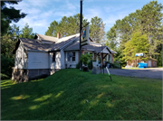 11823W State Highway 77, a Cross Gabled resort/camp building, built in Hayward, Wisconsin in 1950.
