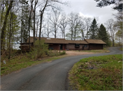 12733W Wildwood Avenue, a Rustic Style resort/camp building, built in Hayward, Wisconsin in 1910.