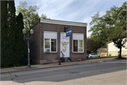 320 Main St., a Commercial Vernacular retail building, built in Black River Falls, Wisconsin in 1913.