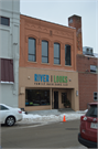 311 GRAHAM AVE, a Commercial Vernacular small retail building, built in Eau Claire, Wisconsin in 1896.