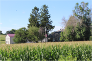 S SIDE OF SCHNEIDER RD, .2 M W OF US 51, a Gabled Ell house, built in Dunn, Wisconsin in 1855.