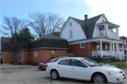 2063 Douglas Ave, a Dutch Colonial Revival house, built in Racine, Wisconsin in 1910.