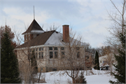 1651-5 S. Bear Lake Lane, a one to six room school, built in Dresser, Wisconsin in 1921.