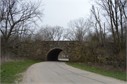 Wisconsin & Southern RR over Goette Rd, a NA (unknown or not a building) stone arch bridge, built in Merrimac, Wisconsin in 1878.