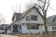 7043 Wells Street, a Arts and Crafts house, built in Wauwatosa, Wisconsin in 1915.