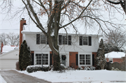 671 N 76th Street, a Colonial Revival/Georgian Revival house, built in Wauwatosa, Wisconsin in 1956.