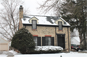 8118	Currie Avenue, a Colonial Revival/Georgian Revival house, built in Wauwatosa, Wisconsin in 1936.