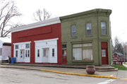 102-104 HOTEL ST, a Commercial Vernacular small retail building, built in Brooklyn, Wisconsin in 1909.