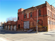 100 E SEEBOTH ST, a Romanesque Revival warehouse, built in Milwaukee, Wisconsin in 1868.