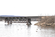 C&NW RR bridge across Wisconsin River at Merrimac, a NA (unknown or not a building) deck truss bridge, built in Merrimac, Wisconsin in 1878.