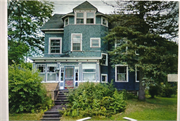 704 Ash Street, a Queen Anne, built in Baraboo, Wisconsin in 1860.