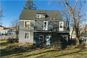 704 Ash Street, a Queen Anne, built in Baraboo, Wisconsin in 1860.