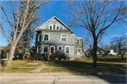 704 Ash Street, a Queen Anne, built in Baraboo, Wisconsin in 1860.