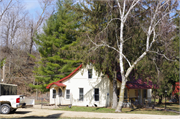 Located on the southwest side of Boice Creek Road, approximately 0.45-mile northwest of the intersection with Kerr Road, a Side Gabled house, built in Lancaster, Wisconsin in 1900.