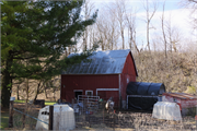 Located on the southwest side of Boice Creek Road, approximately 0.45-mile northwest of the intersection with Kerr Road, a Side Gabled house, built in Lancaster, Wisconsin in 1900.