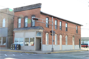SW CORNER OF PEARL ST AND WOLF RIVER AVE, a Boomtown retail building, built in New London, Wisconsin in .