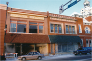 107 W NORTH WATER ST, a Commercial Vernacular retail building, built in New London, Wisconsin in 1908.