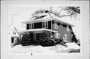 707 N 7TH ST, a American Foursquare house, built in Manitowoc, Wisconsin in 1915.