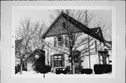 1135 S 7TH ST, a Queen Anne house, built in Manitowoc, Wisconsin in 1889.