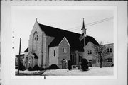 521 N 8TH ST, a Late Gothic Revival church, built in Manitowoc, Wisconsin in 1940.