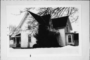 940 N 8TH ST, a Early Gothic Revival house, built in Manitowoc, Wisconsin in 1860.