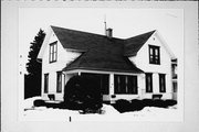 936 N 9TH ST, a Gabled Ell house, built in Manitowoc, Wisconsin in 1897.