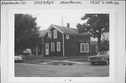 1235 S 9TH ST, a Gabled Ell house, built in Manitowoc, Wisconsin in 1890.
