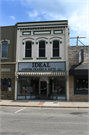 1040 MAIN ST, a Italianate small retail building, built in Stevens Point, Wisconsin in 1883.