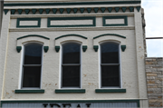 1040 MAIN ST, a Italianate small retail building, built in Stevens Point, Wisconsin in 1883.
